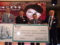 Photo of Gree Commercial officials and MCC HVAC/R program coordinator John Troy